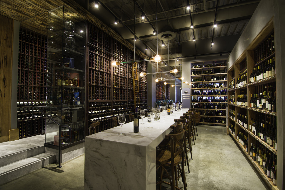 Odessa, TX expansive racking with aisle lighting in a luxury estate cellar