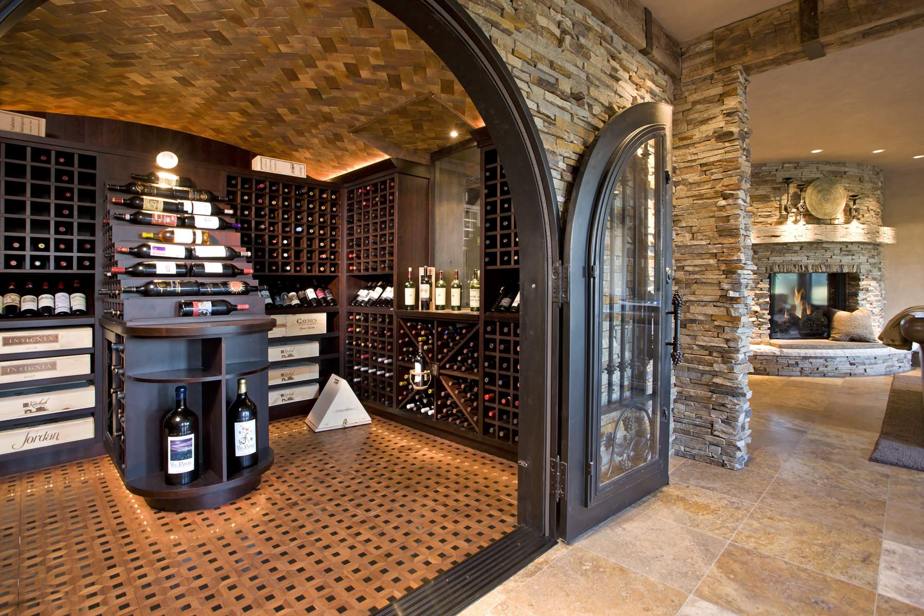 Rustic wine room with reclaimed wood in Midland, TX