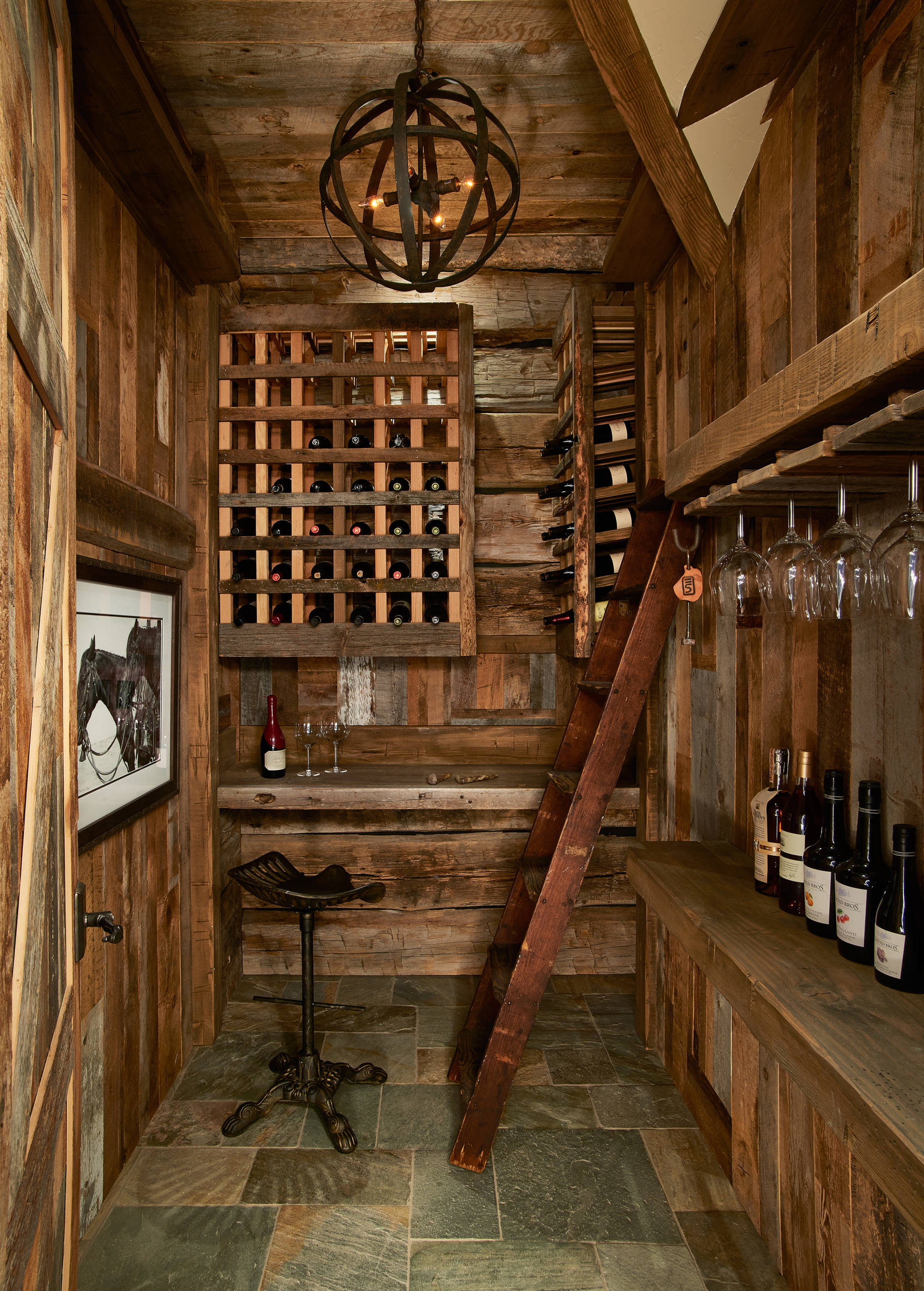 Modern rustic wine room retreat in Grassland Estates, Midland TX with warm lighting