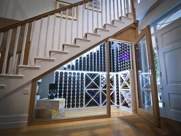 Space-efficient under-stair wine cabinet in Midland Texas